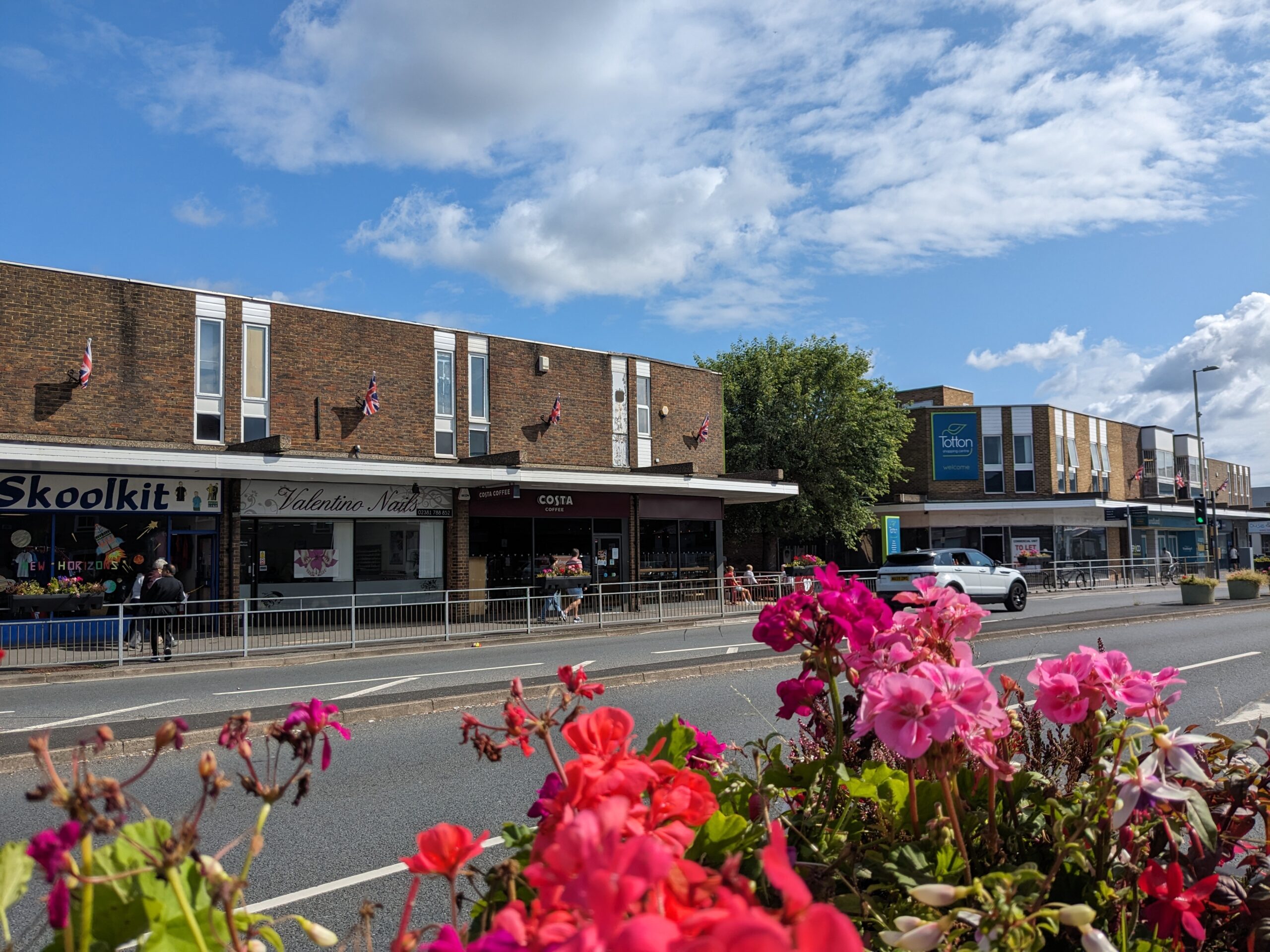 Shops and summer flowers in town centre